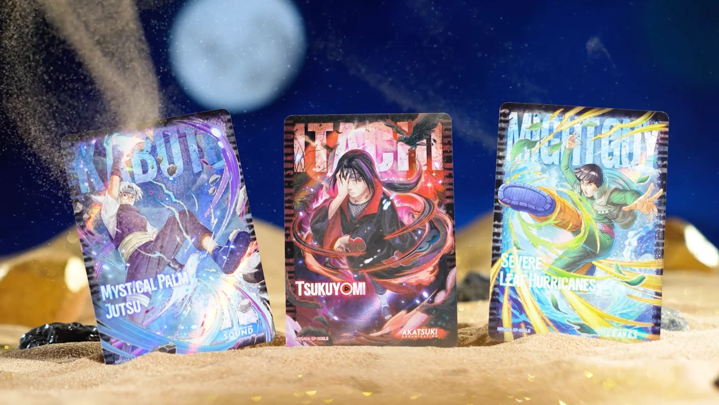 Three KAYOU Jin Chapter Series 4 SP cards, Kabuto, Itachi and Might Guy, on sand under a night sky
